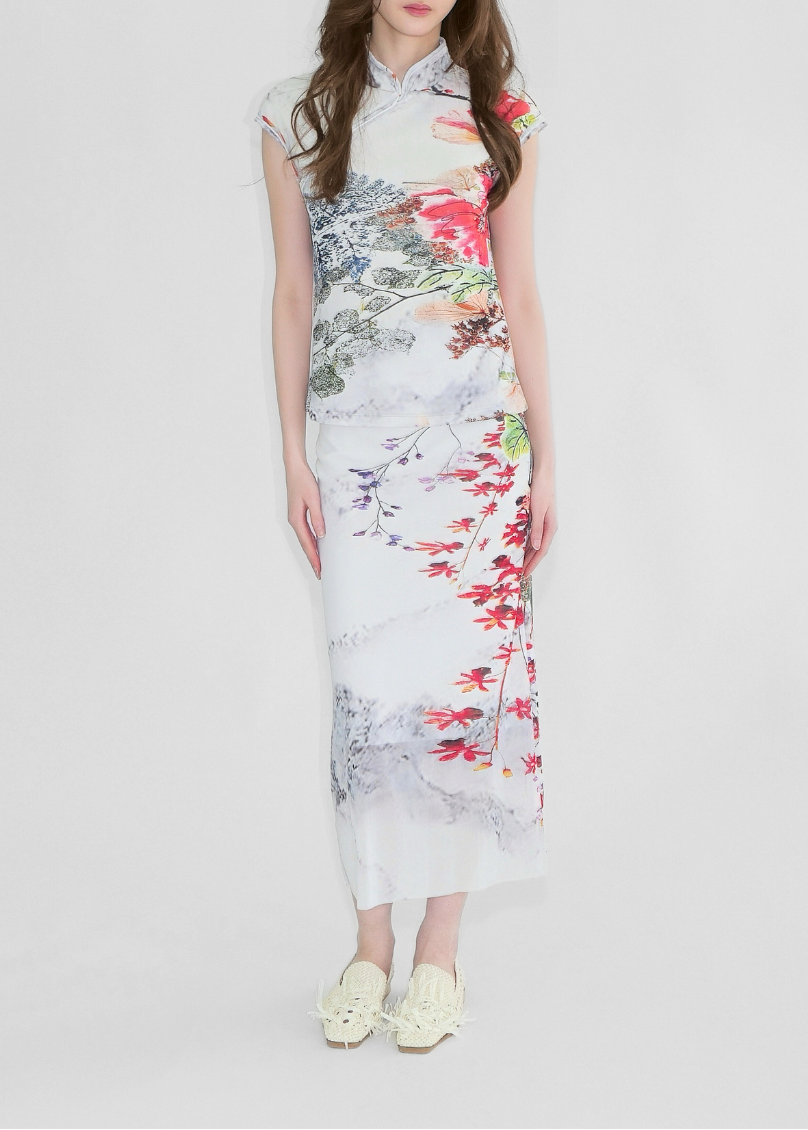Woman wearing a floral dress on a white background