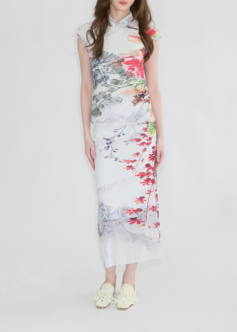Woman wearing a floral dress on a white background