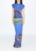 A long skirt with a netting design featuring goldfish and a landscape in blue tones.