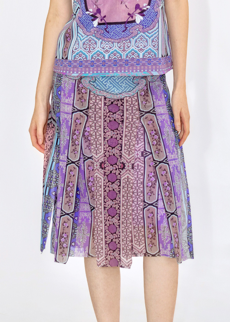 Patterned dress with a purple and blue design on a white background