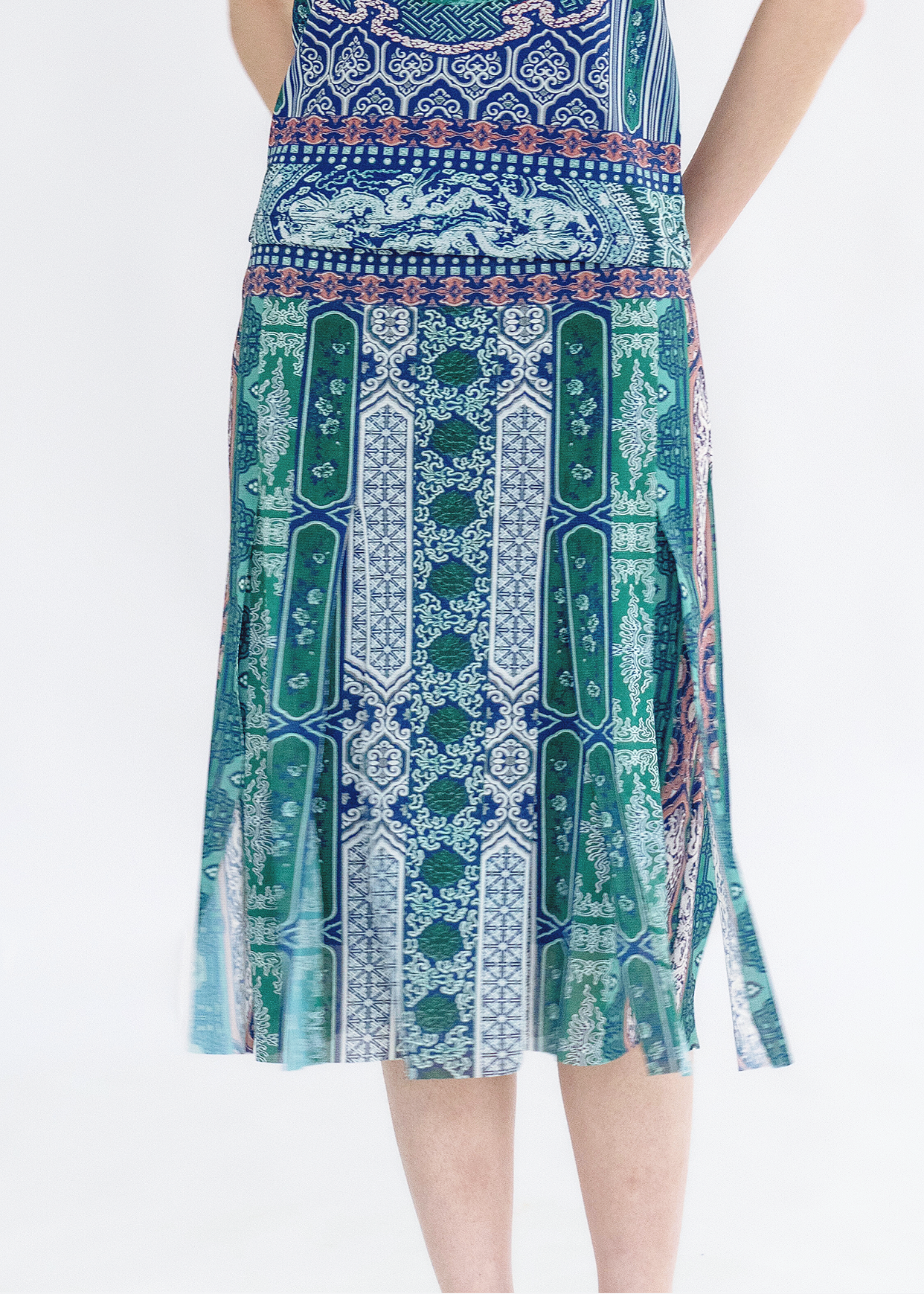 A knee-length skirt with a geometric pattern in blue, white, and red colors.