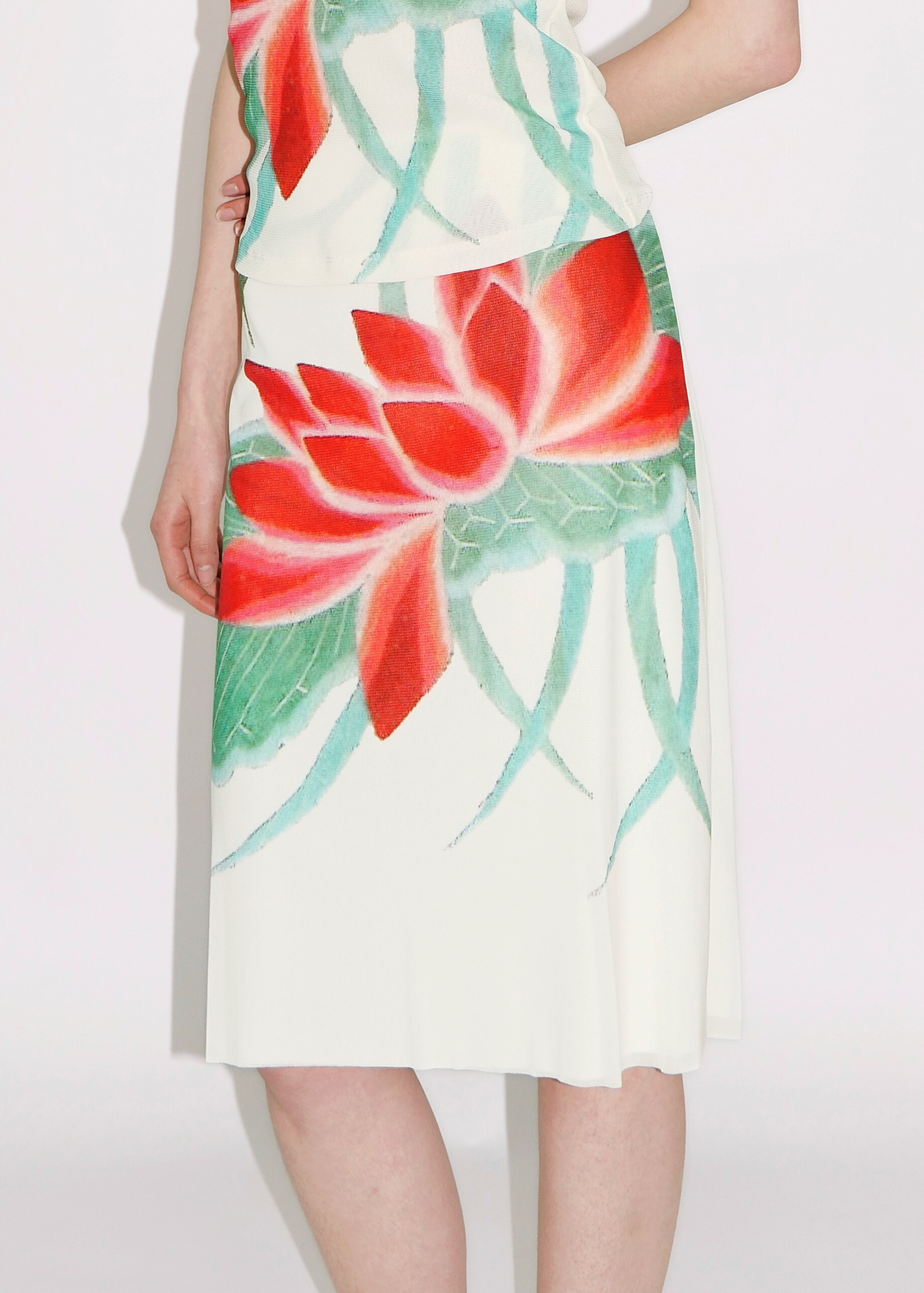 Skirt with red floral design on a white background